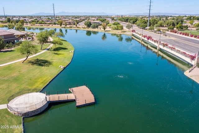 bird's eye view with a residential view and a water and mountain view