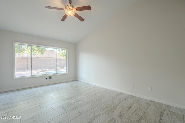 empty room with lofted ceiling and ceiling fan