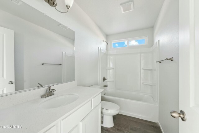 bathroom featuring vanity and a shower with shower door