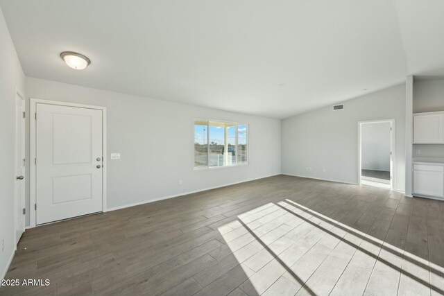 interior space with hardwood / wood-style flooring and sink