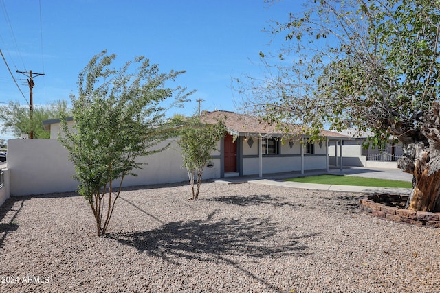 view of front of home with a patio area