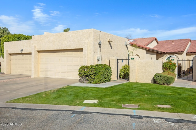 view of front of house featuring a garage and a front lawn