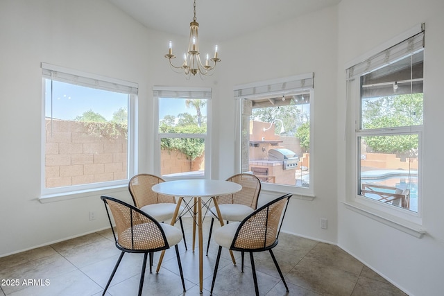 16254 N 48th Way, Scottsdale, AZ 85254 - dining area featuring a chandelier and tile patterned flooring