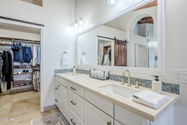 16254 N 48th Way, Scottsdale, AZ 85254 - full bath with double vanity, backsplash, and a spacious closet