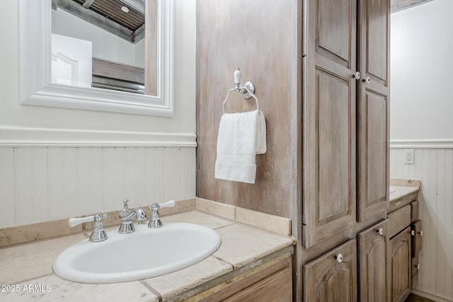 16254 N 48th Way, Scottsdale, AZ 85254 - bathroom featuring vanity, a wainscoted wall, and wood walls