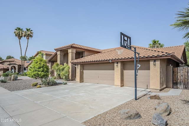 16254 N 48th Way, Scottsdale, AZ 85254 - mediterranean / spanish house with stucco siding, a tiled roof, a garage, and driveway