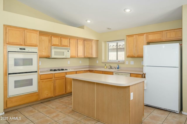 9446 E Olla Ave, Mesa, AZ 85212 - kitchen featuring white appliances, light tile patterned floors, light countertops, a sink, and light brown cabinetry