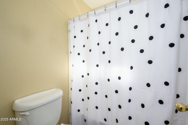 9446 E Olla Ave, Mesa, AZ 85212 - interior space featuring toilet and a shower with shower curtain