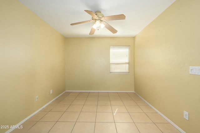 9446 E Olla Ave, Mesa, AZ 85212 - unfurnished room with light tile patterned floors, baseboards, and a ceiling fan