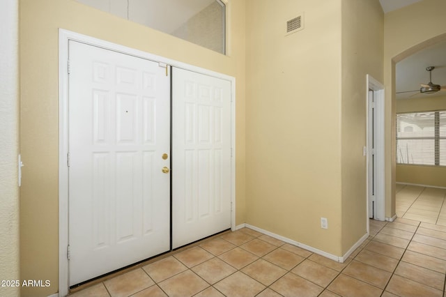 9446 E Olla Ave, Mesa, AZ 85212 - entryway with arched walkways, light tile patterned floors, visible vents, and baseboards