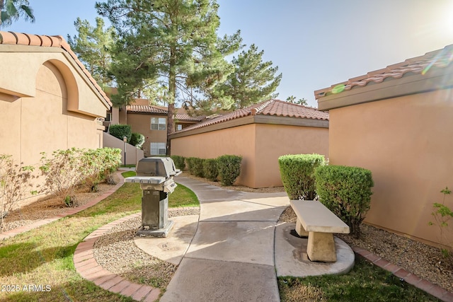 view of yard featuring a patio and fence