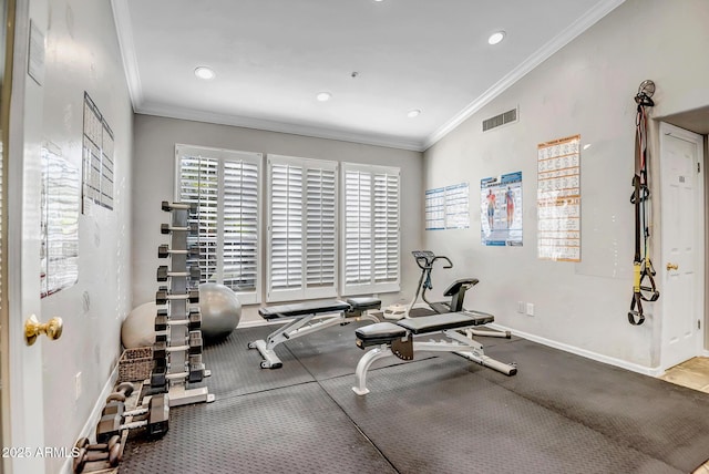 exercise room with visible vents, recessed lighting, baseboards, and ornamental molding