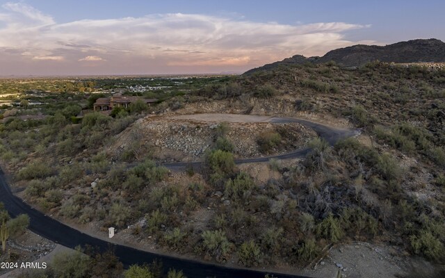 aerial view at dusk with a mountain view