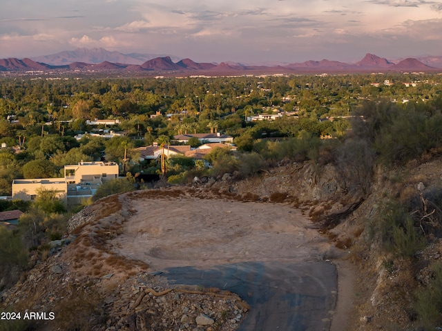 aerial view at dusk with a mountain view