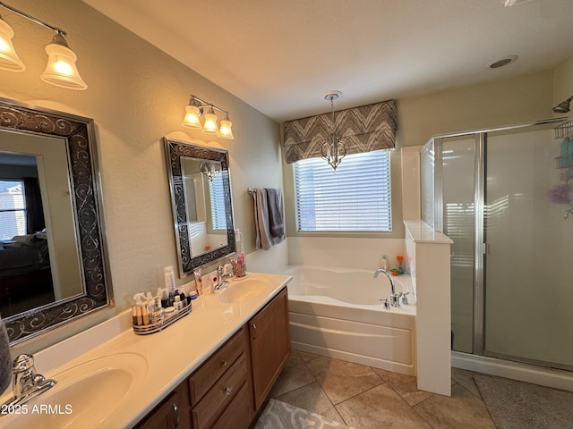 bathroom with tile patterned floors, shower with separate bathtub, and vanity