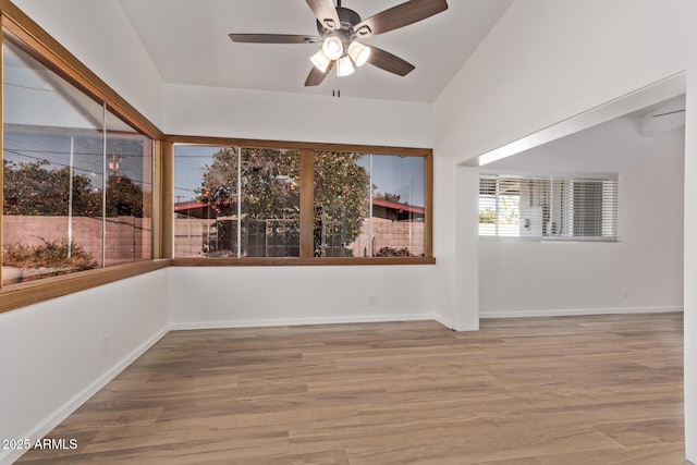 unfurnished room featuring ceiling fan and wood-type flooring