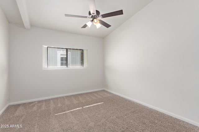 empty room with vaulted ceiling, carpet floors, and ceiling fan