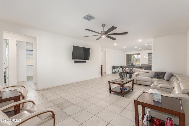 living room with light tile patterned floors, recessed lighting, visible vents, and ceiling fan