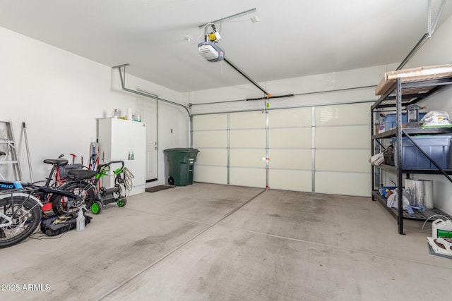 garage featuring a garage door opener