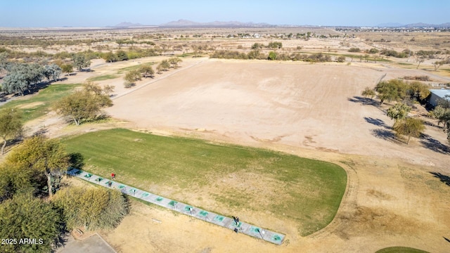 birds eye view of property with a rural view and a mountain view