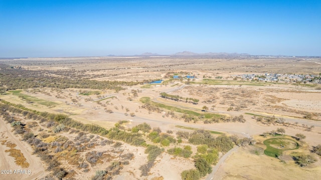 bird's eye view with view of desert, a rural view, and a mountain view