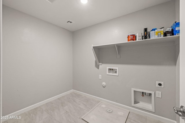 washroom featuring washer hookup, electric dryer hookup, gas dryer hookup, and baseboards