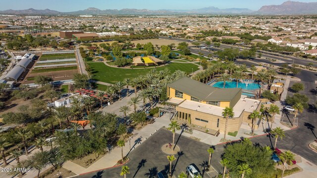 aerial overview of property's location featuring a pool and mountains