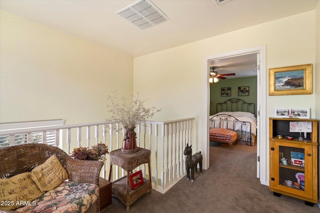 carpeted bedroom with visible vents