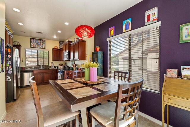 dining space with recessed lighting, visible vents, and light tile patterned floors