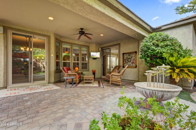 view of patio / terrace with ceiling fan