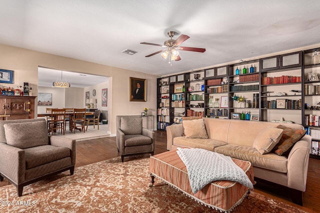 12423 N 64th St, Scottsdale, AZ 85254 - living area with wood finished floors, ceiling fan, and baseboards