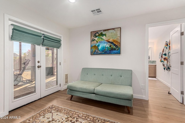 12423 N 64th St, Scottsdale, AZ 85254 - sitting room featuring wood finished floors, french doors, recessed lighting, and baseboards