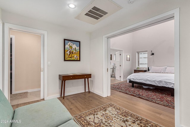 12423 N 64th St, Scottsdale, AZ 85254 - bedroom featuring wood finished floors and baseboards