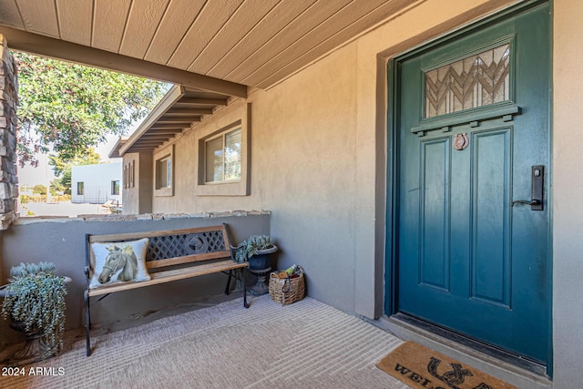 12423 N 64th St, Scottsdale, AZ 85254 - view of exterior entry featuring stucco siding