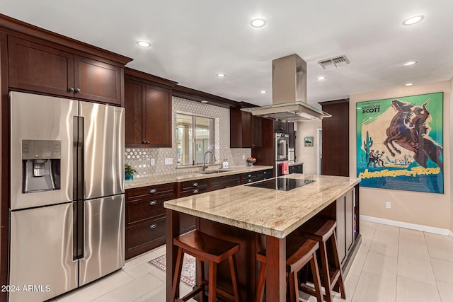 12423 N 64th St, Scottsdale, AZ 85254 - kitchen featuring appliances with stainless steel finishes, a sink, island range hood, dark brown cabinets, and backsplash