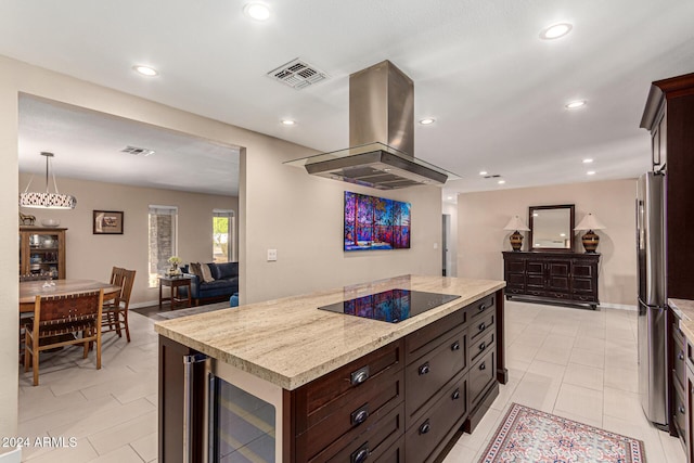 12423 N 64th St, Scottsdale, AZ 85254 - kitchen with island exhaust hood, black electric cooktop, a kitchen island, recessed lighting, and beverage cooler
