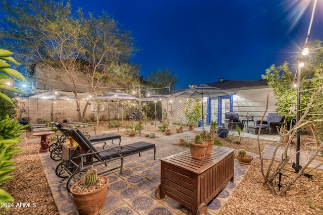 view of patio at twilight