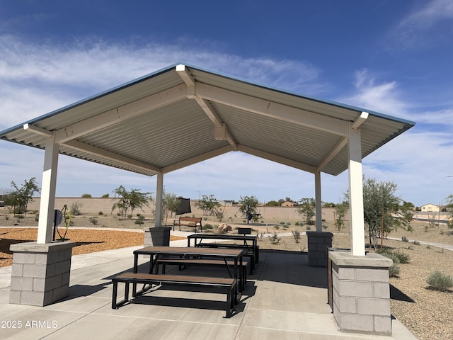 surrounding community with a gazebo and a patio