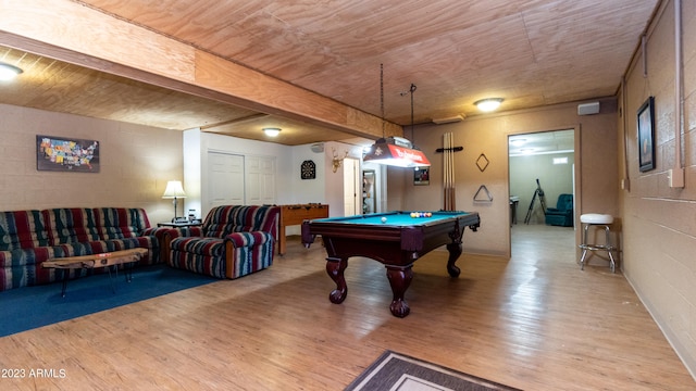 recreation room with billiards and light hardwood / wood-style flooring