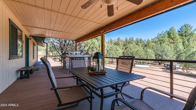 wooden deck with ceiling fan