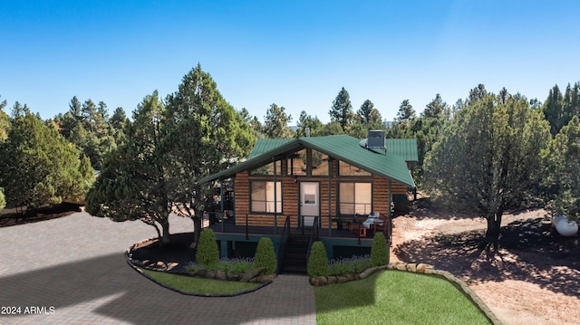 131 E Jackshoe Trl, Payson, AZ 85541 - view of front of home featuring metal roof, stairway, a chimney, and log siding