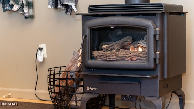 interior details featuring a wood stove