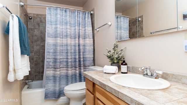 full bathroom featuring vanity, shower / bath combo, and toilet