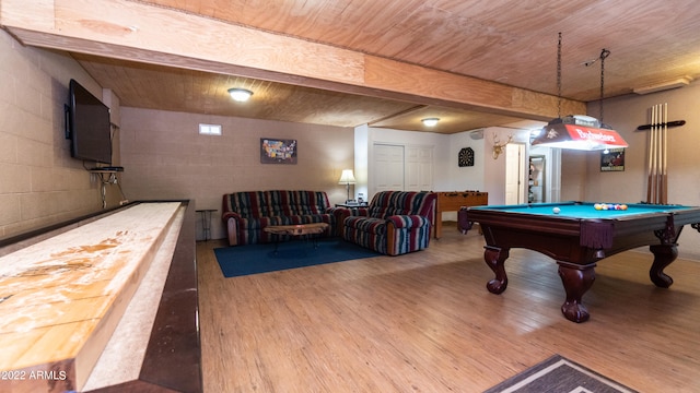 playroom featuring beamed ceiling, hardwood / wood-style floors, and pool table