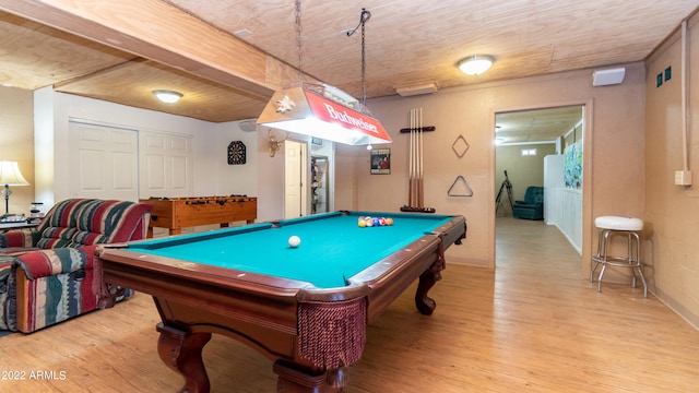 rec room with light hardwood / wood-style floors and billiards