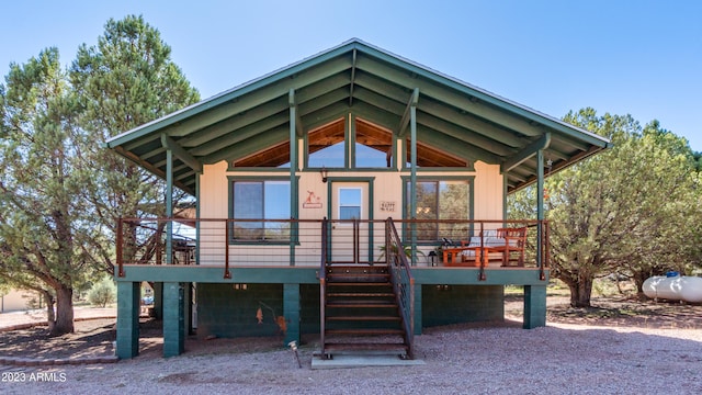 view of front of house with a wooden deck