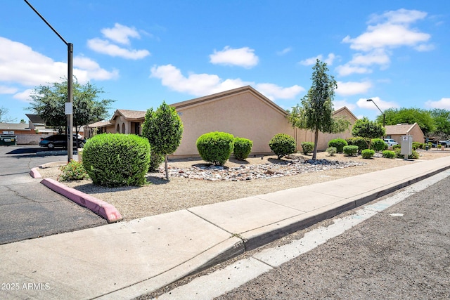 3027 E Grandview Rd Unit 1, Phoenix, AZ 85032 - view of home's exterior with stucco siding