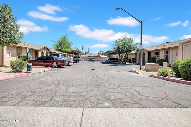 3027 E Grandview Rd Unit 1, Phoenix, AZ 85032 - view of street featuring a residential view, street lighting, and curbs