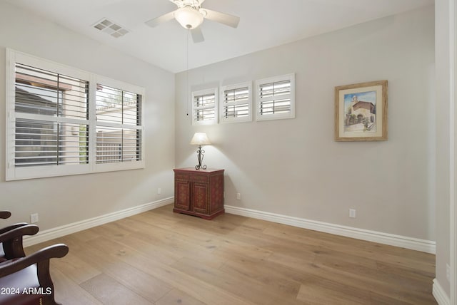 interior space with ceiling fan and light hardwood / wood-style floors