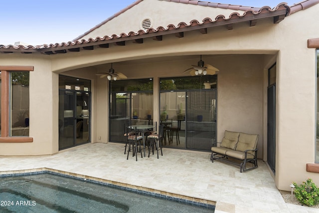 view of patio with ceiling fan